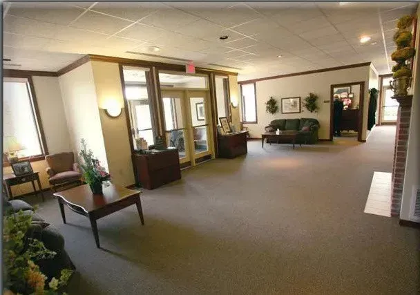 A living room with a couch and a coffee table