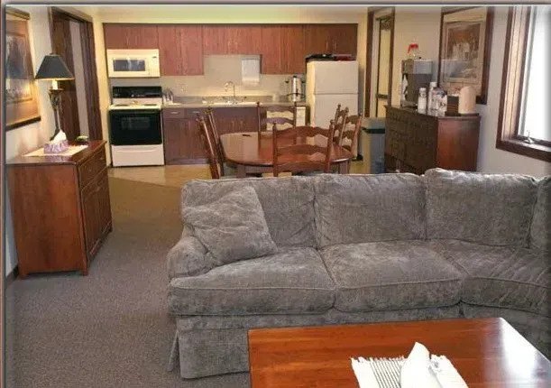 A living room with a couch and a coffee table