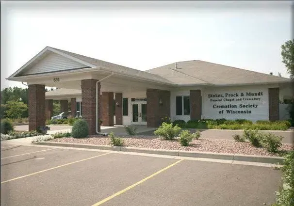 A brick building with a sign that says ' johnson first & health ' on it