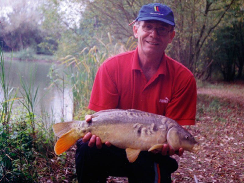 a man holding the fish