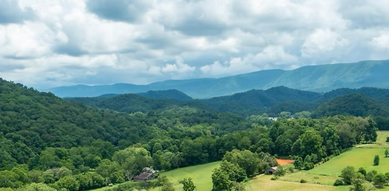 An aeriel shot of mountains in Bluff City Tennessee
