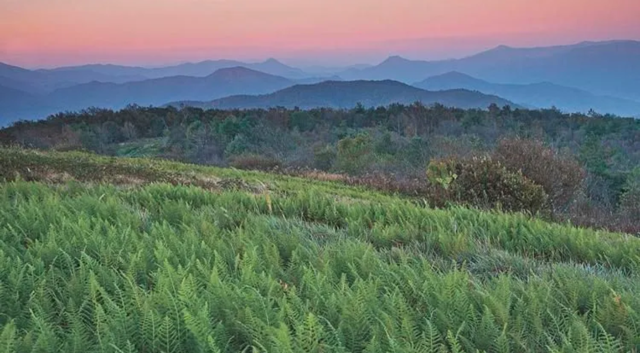 A picture at sunset showing the rolling mountains in Unicoi County Tennessee