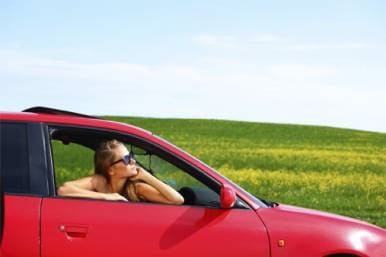 Woman in a red car, Sherman, TX