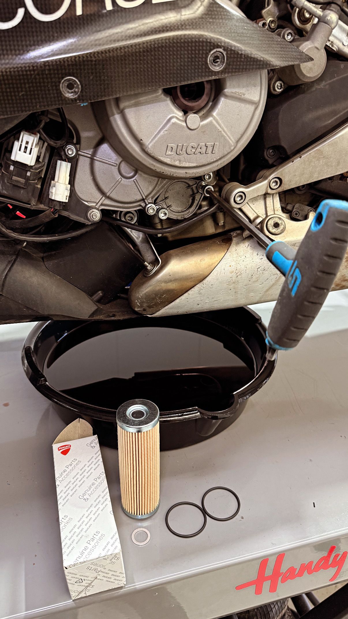 Carbon accessories on the side of a Ducati Motorcycle.