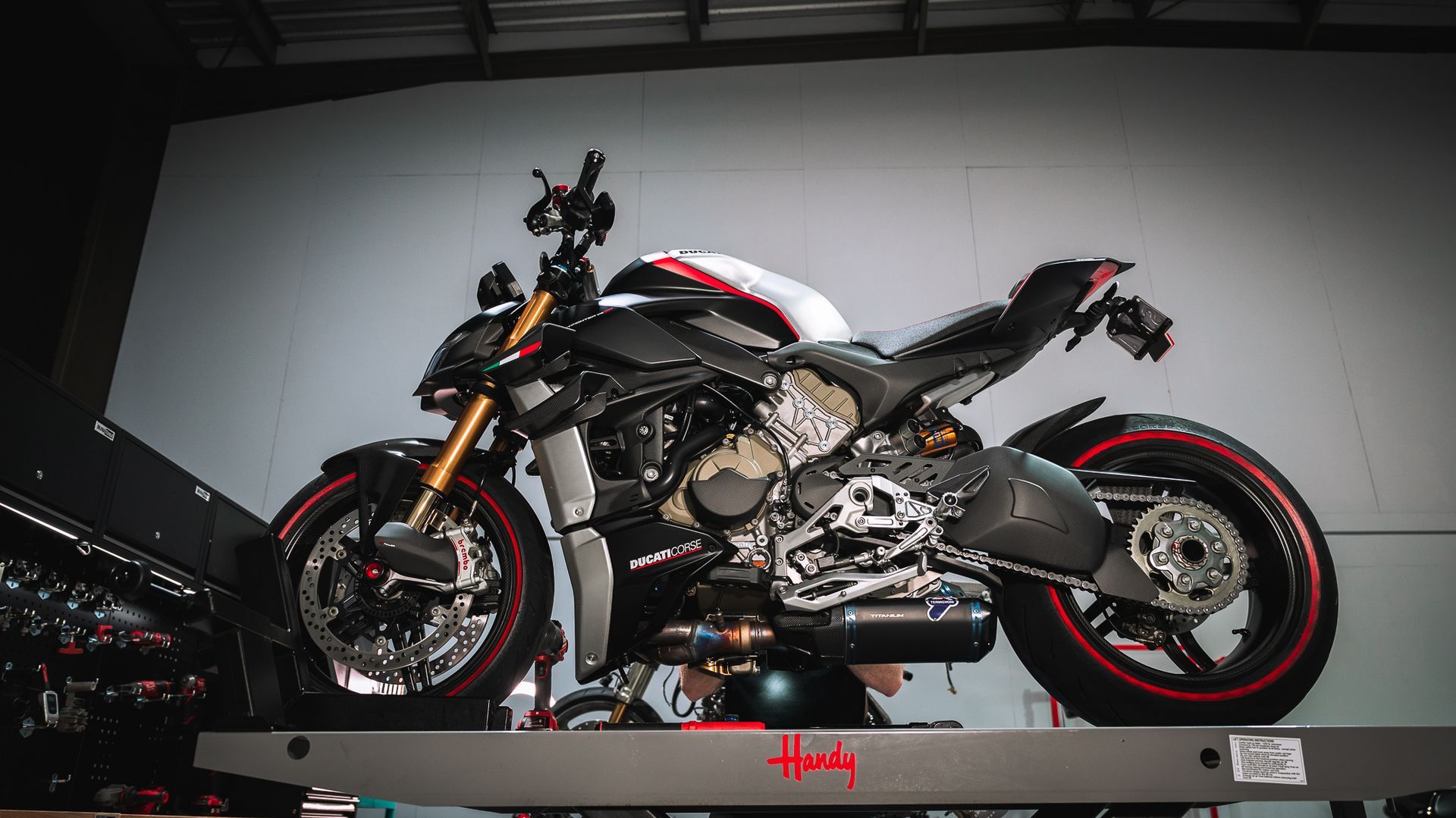 A V4 SP2 Streetfighter mounted to the workshop bench at DUC LAB