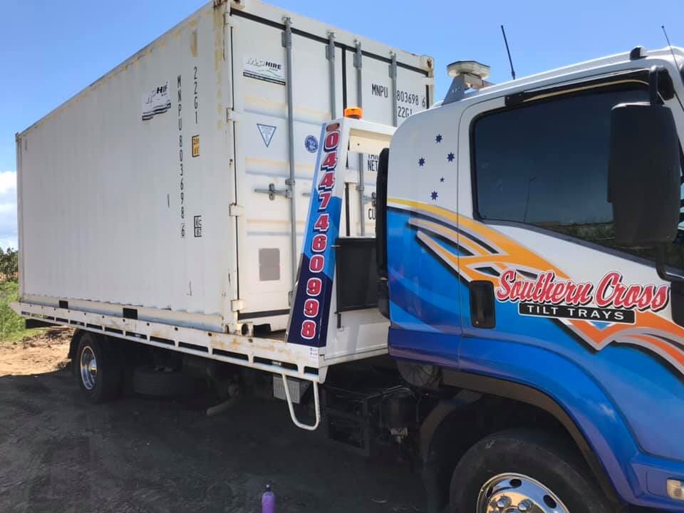 A Blue and White Tow Truck With the Word Saddle Creek on the Side — Southern Cross Tilt Trays in Andergrove, QLD