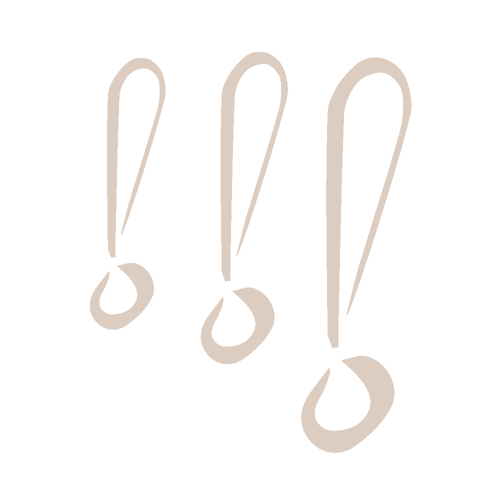 Hands pointing at a document on a table during a meeting; blurry background with people.