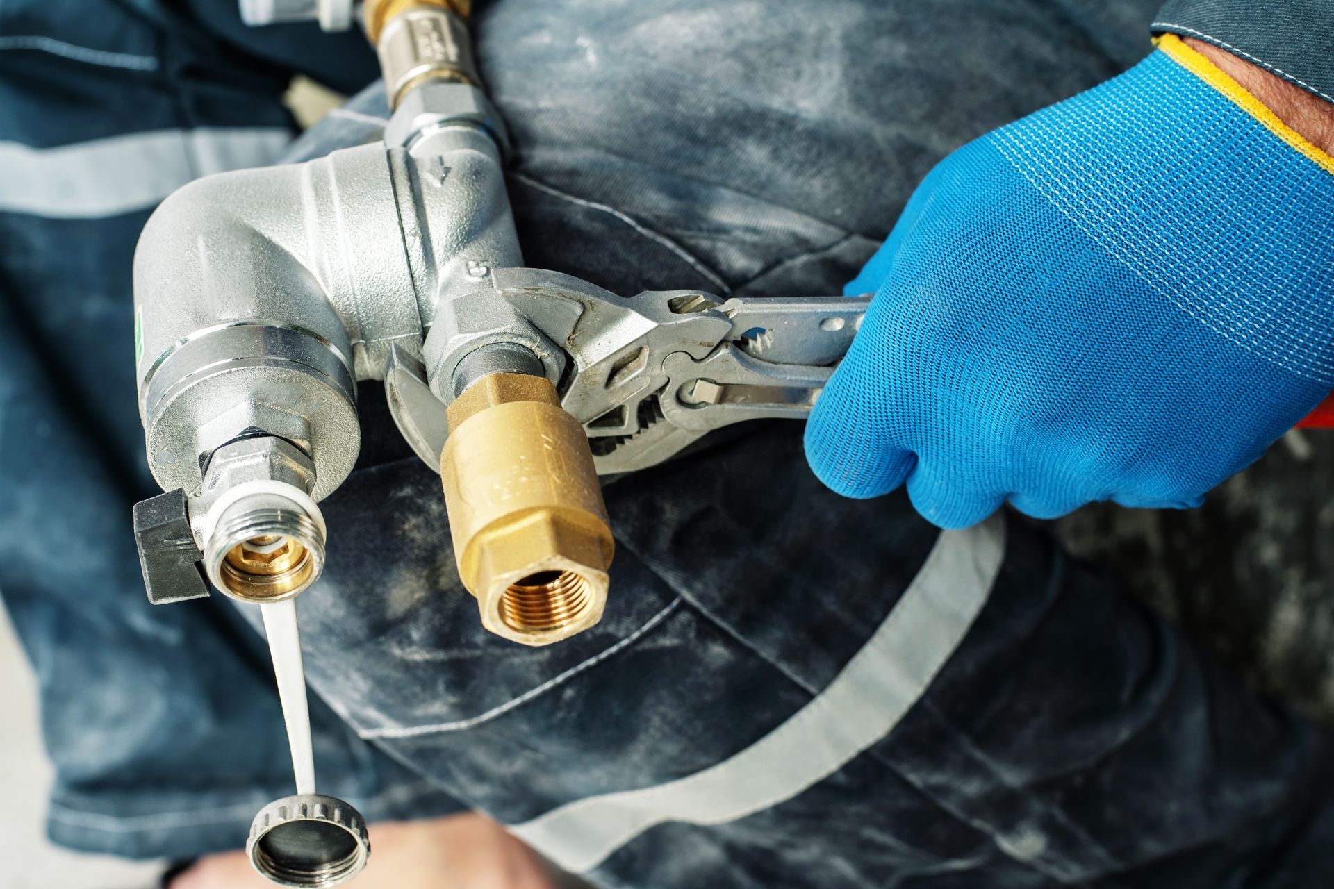 A Man and a Woman Are Standing in a Kitchen Looking at a Tablet
