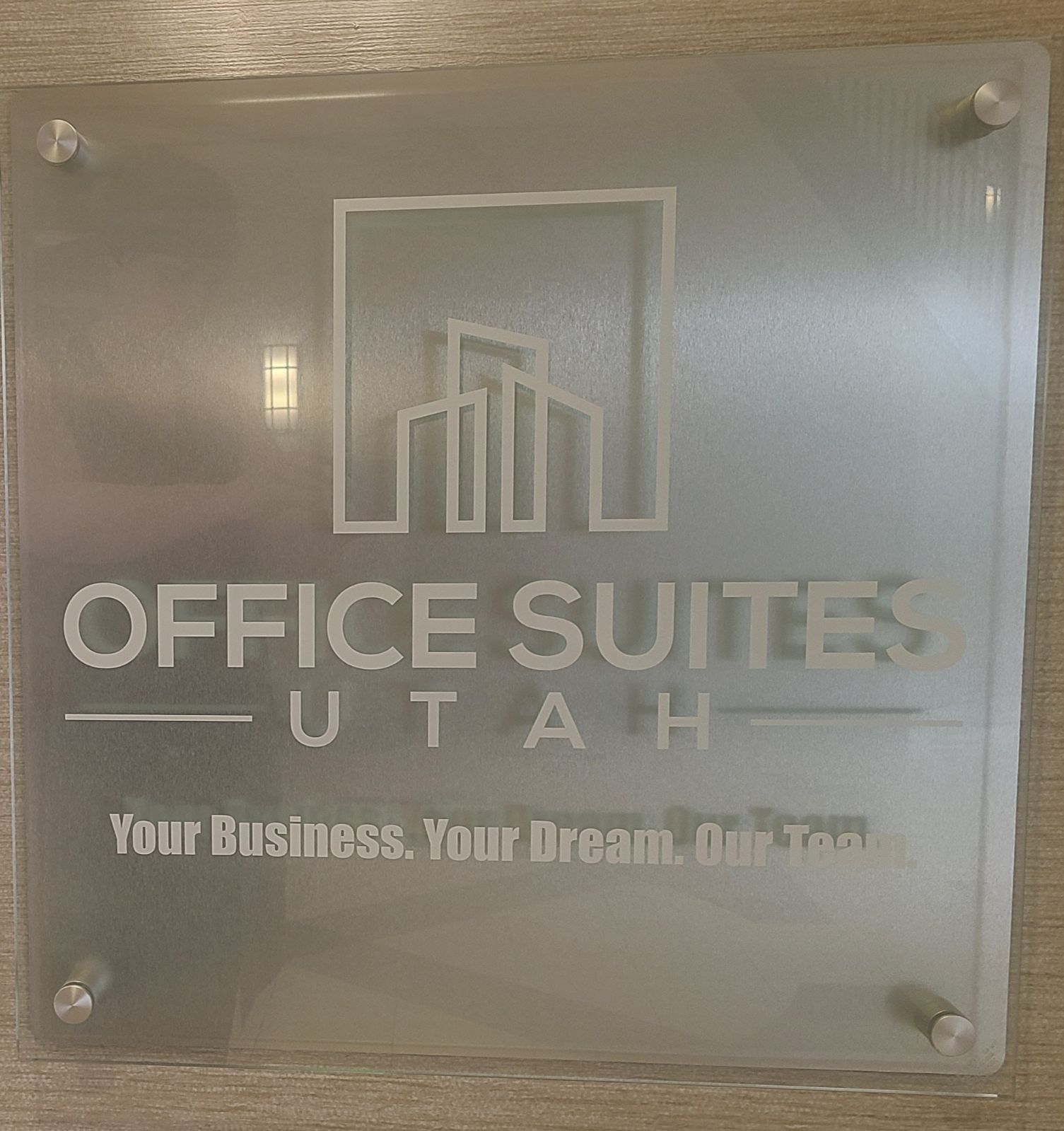 A sign that says office suites Utah on it