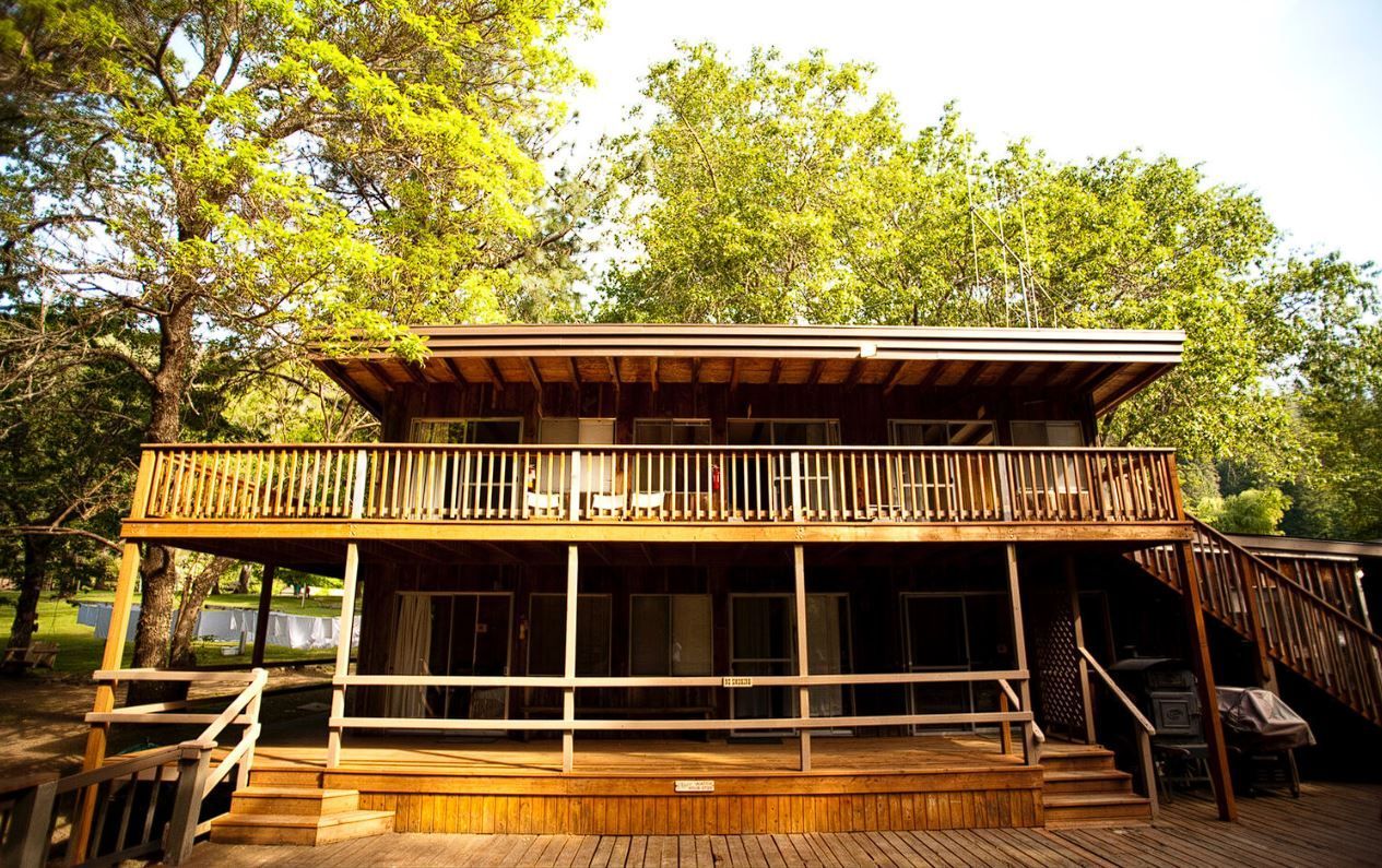 Paradise Lodge photo showing the exterior with decks