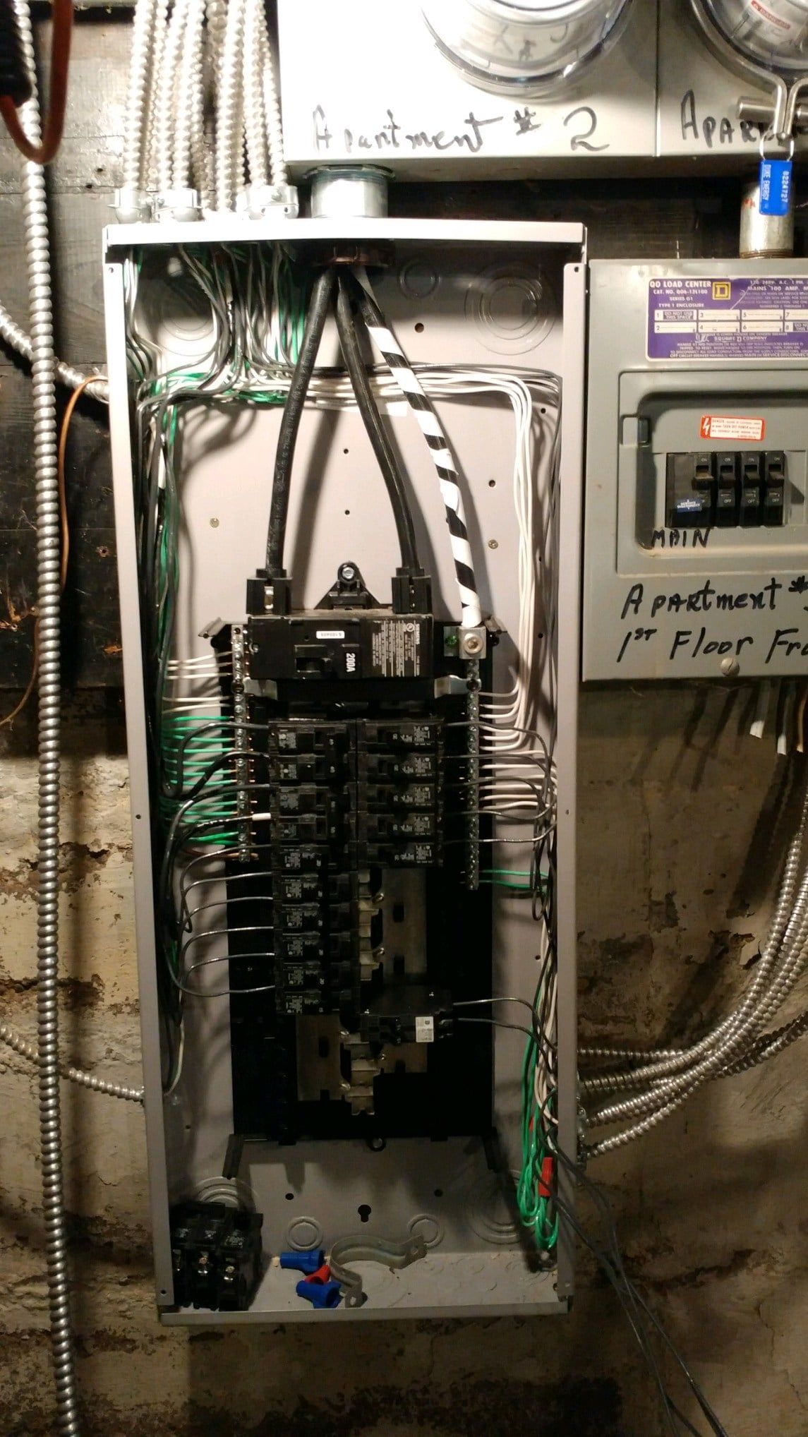 A electrical box with a bunch of wires coming out of it.