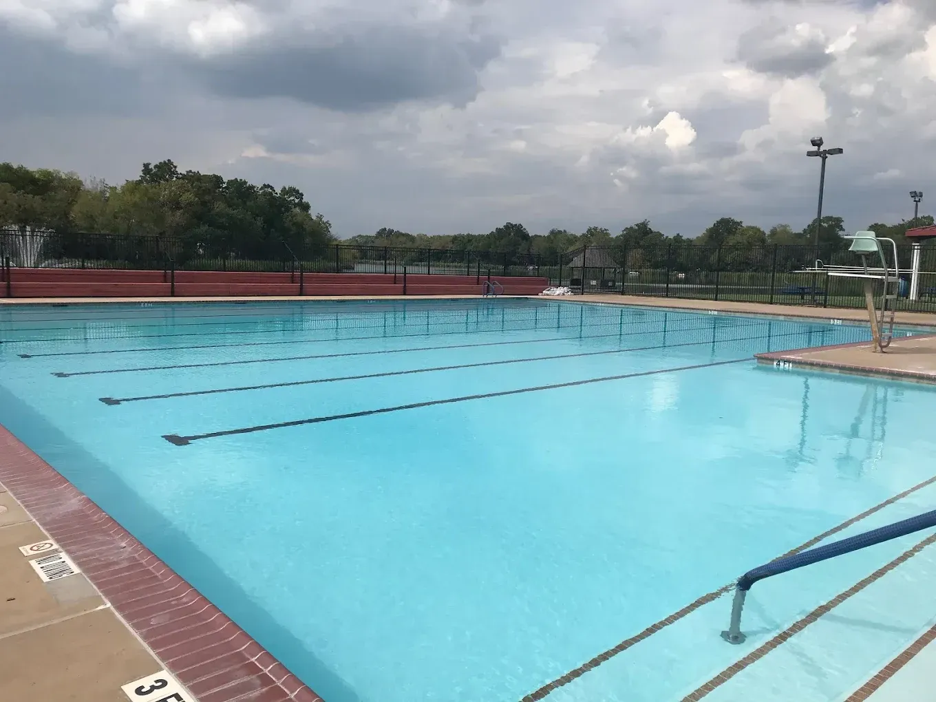 A large swimming pool with the number 3 on the side