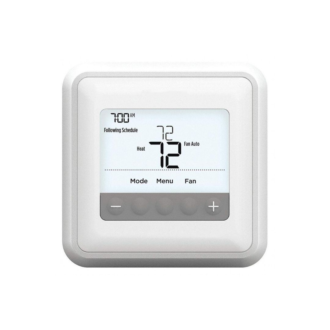 Un termostato blanco con una pantalla que dice 72 grados