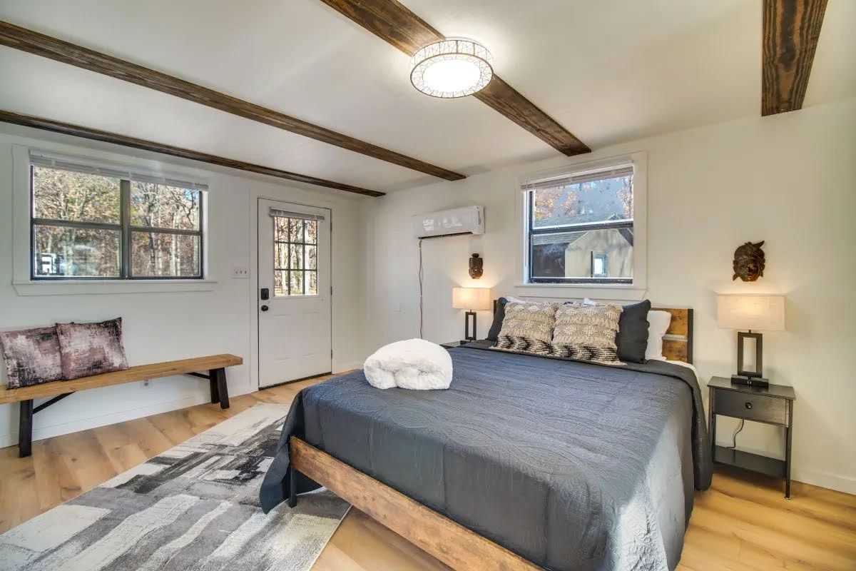 There is a large bed in the middle of the room.