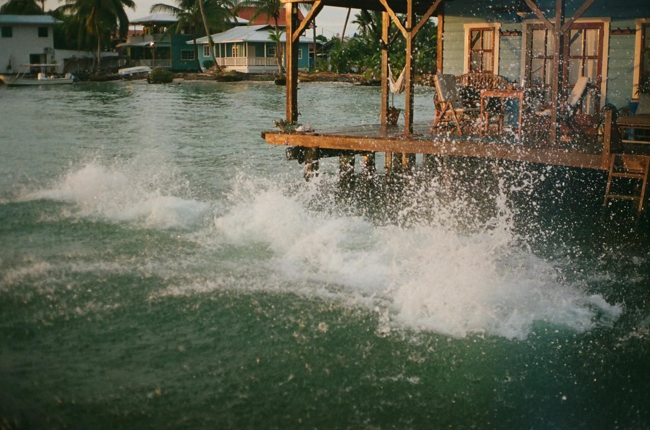 A wooden dock in the middle of a body of water