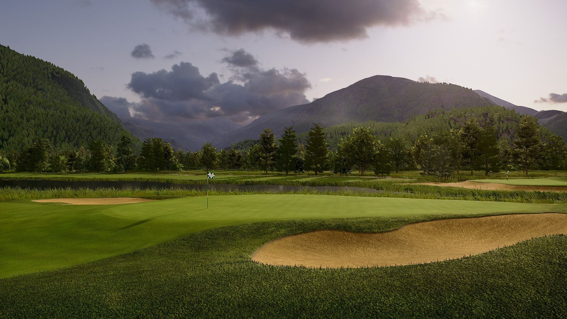 A man is swinging a golf club at a golf ball on a golf course.