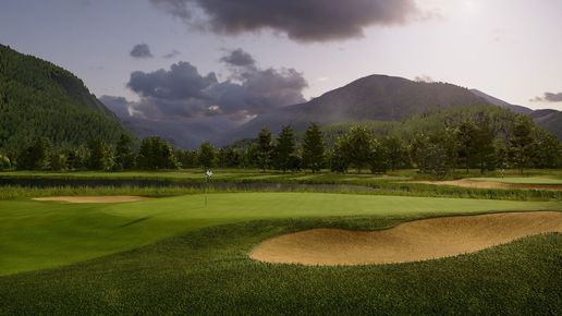 A man is swinging a golf club at a golf ball on a golf course.