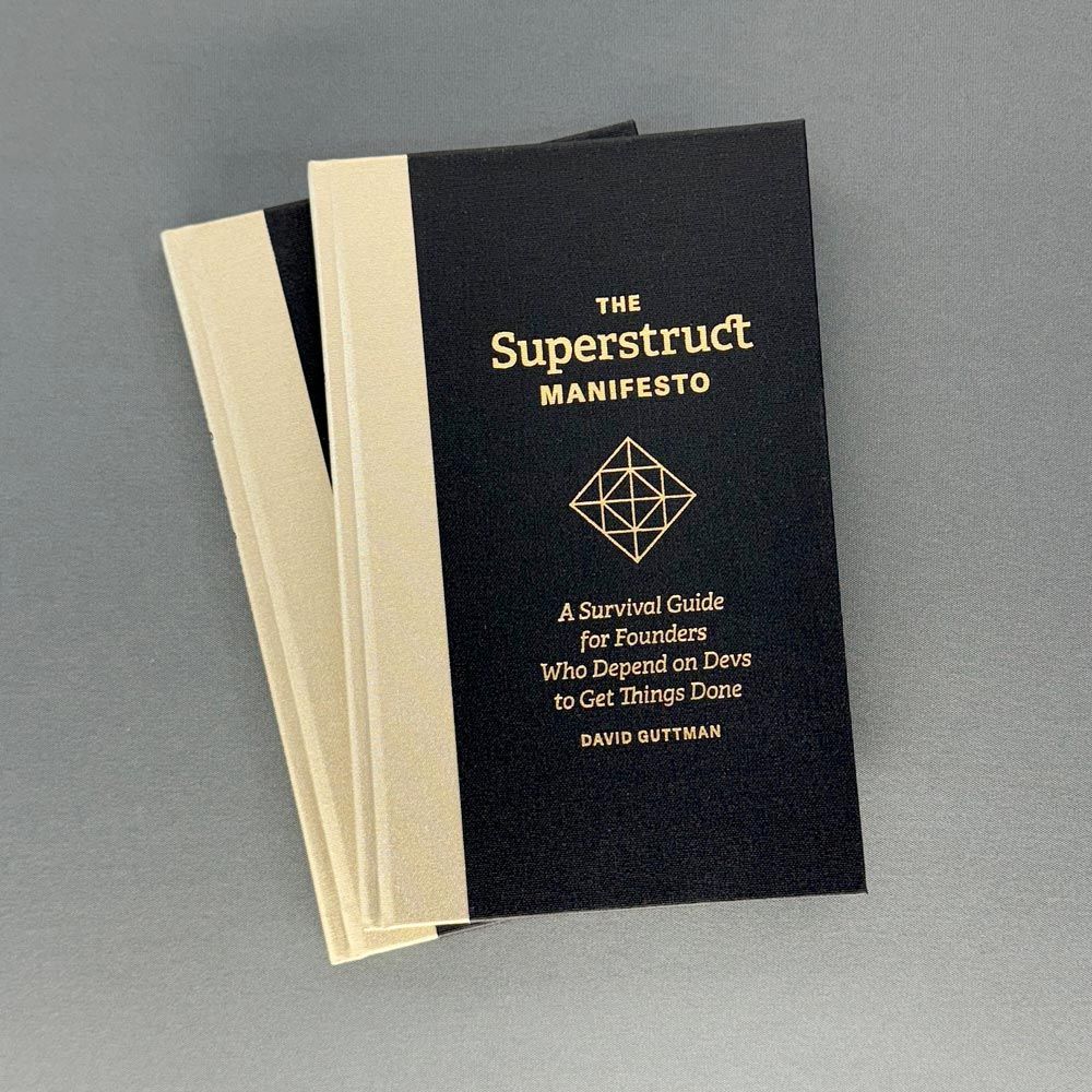 three copies of the superstruct manifesto are stacked on top of each other