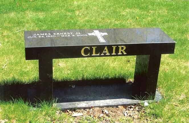 Standing granite monument in cemetery