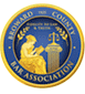 Broward County Bar Association seal with gold and blue, woman reading, scales of justice.