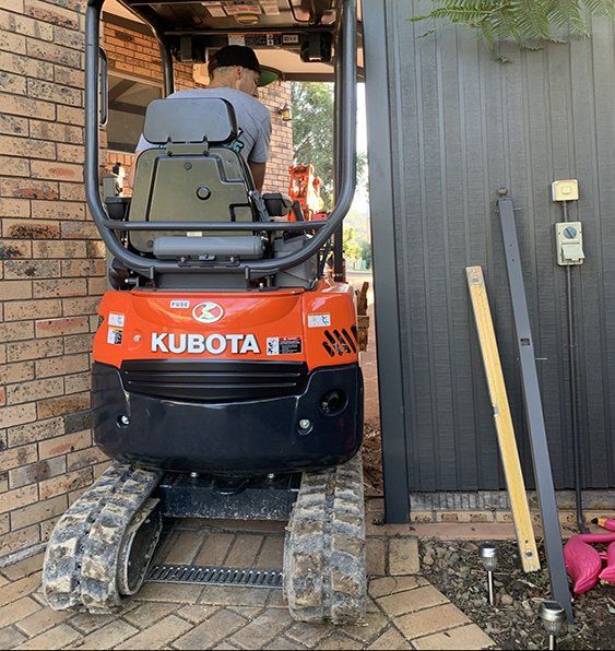 Excavating Side House — Accurate Earthworks from Tight Access Excavation in Wollongong, QLD