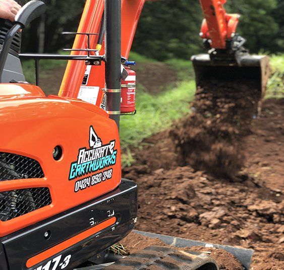 Red Excavation Truck — Accurate Earthworks from About Us in Wollongong, QLD