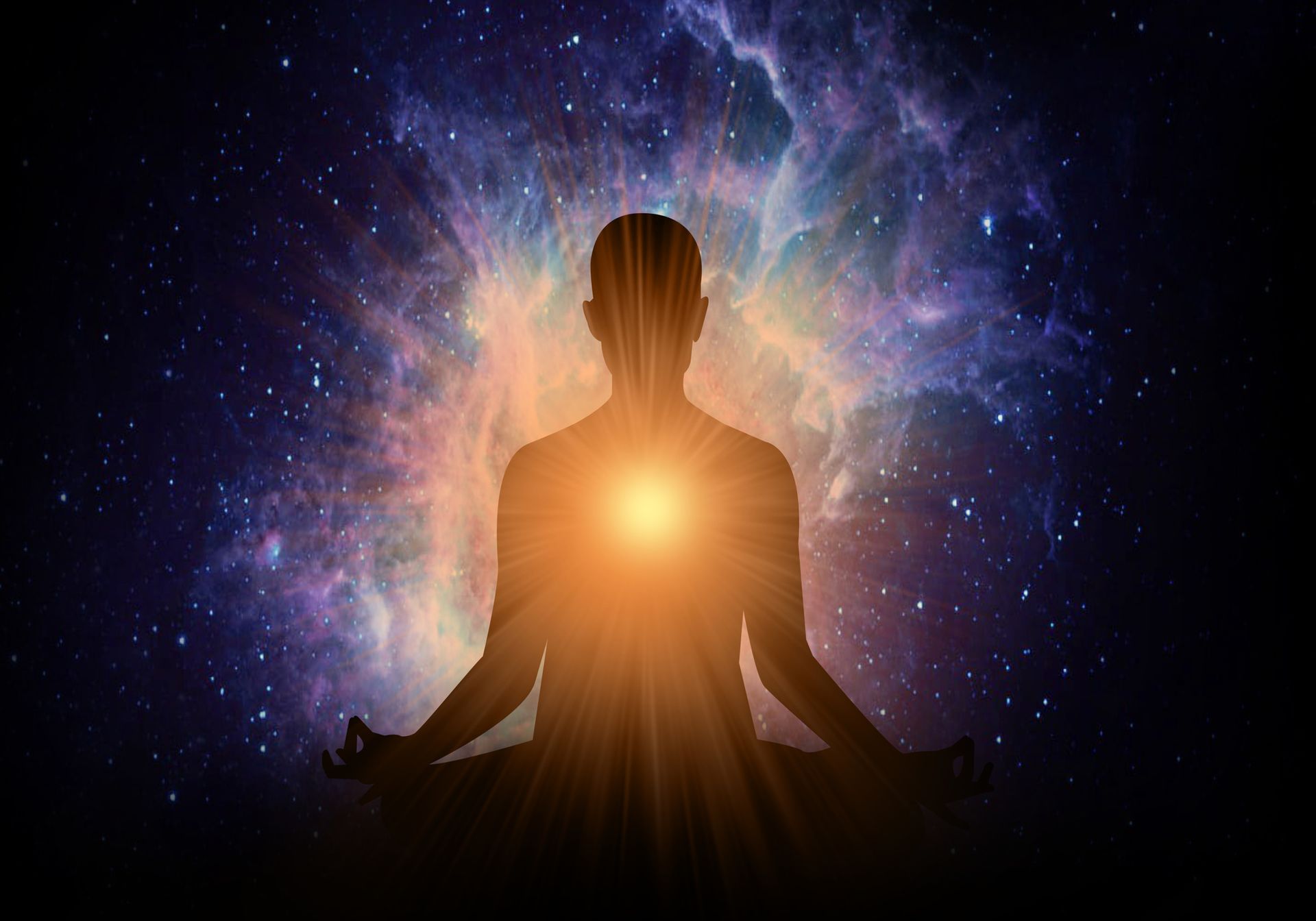 A silhouette of a person sitting in a lotus position with a light coming out of their chest.