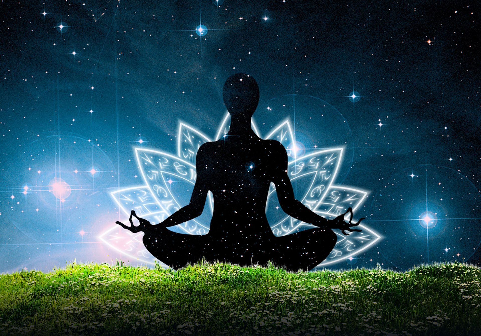 A silhouette of a person sitting in a lotus position