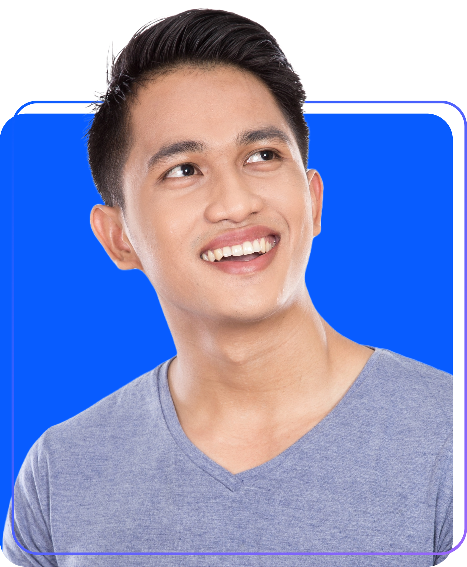 Smiling man in a blue shirt looking upward against a bright blue background