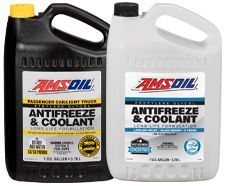 Two AMSOIL antifreeze & coolant jugs: black passenger car/light truck, white professional series.