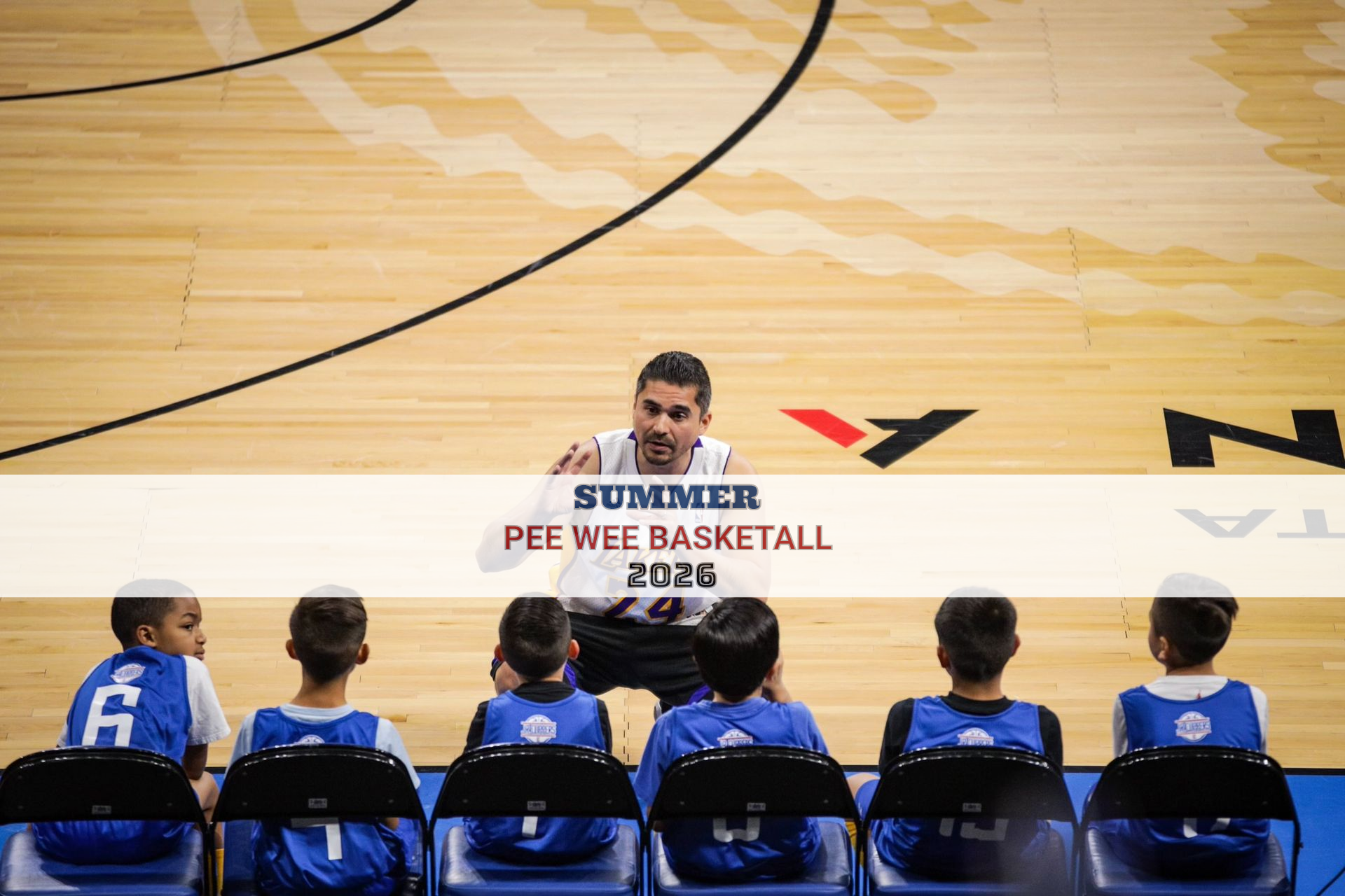 Baseball player sliding into base as another player attempts to catch the ball.