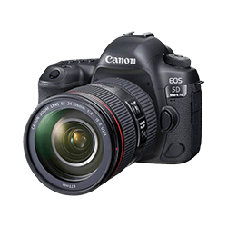 Black Canon EOS 5D Mark IV DSLR camera with lens attached, facing left.
