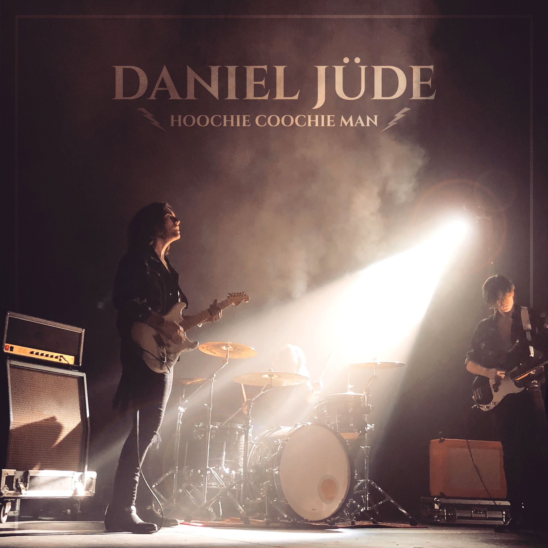 A poster for daniel jude shows a woman playing a guitar