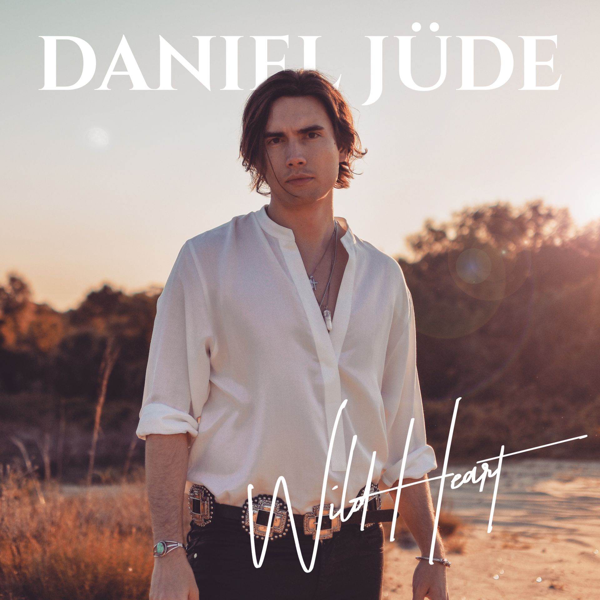 A man in a white shirt is on the cover of a daniel jude album