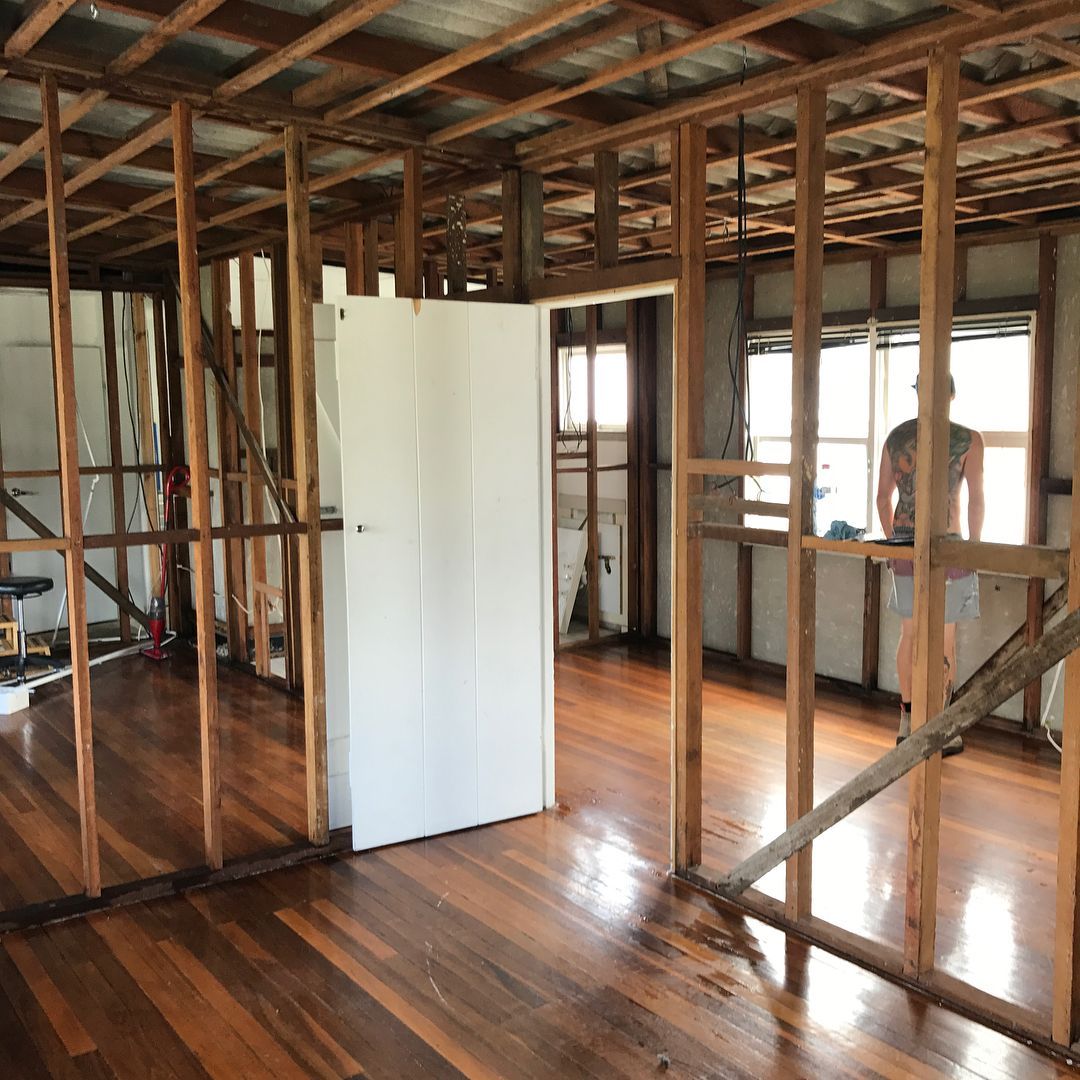 A Room with Wooden Walls and A White Door — Northern Rivers Demolition & Asbestos in Skennars Head, NSW