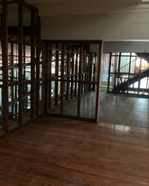An Empty Room with A Staircase in The Background — Northern Rivers Demolition & Asbestos in Skennars Head, NSW