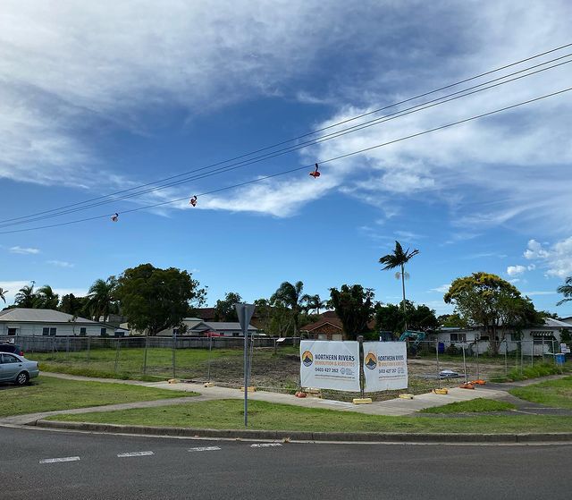 A Street with A Lot of Power Lines Going Over It — Northern Rivers Demolition & Asbestos in Ballina, NSW