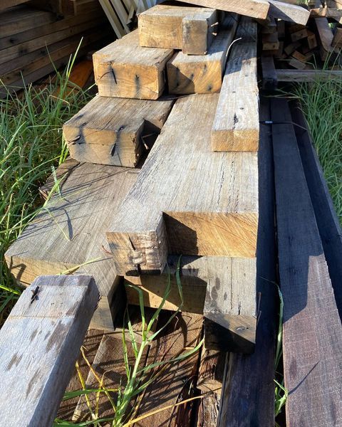 A Bunch of Wood Sitting on Top of Each Other — Northern Rivers Demolition & Asbestos in Skennars Head, NSW