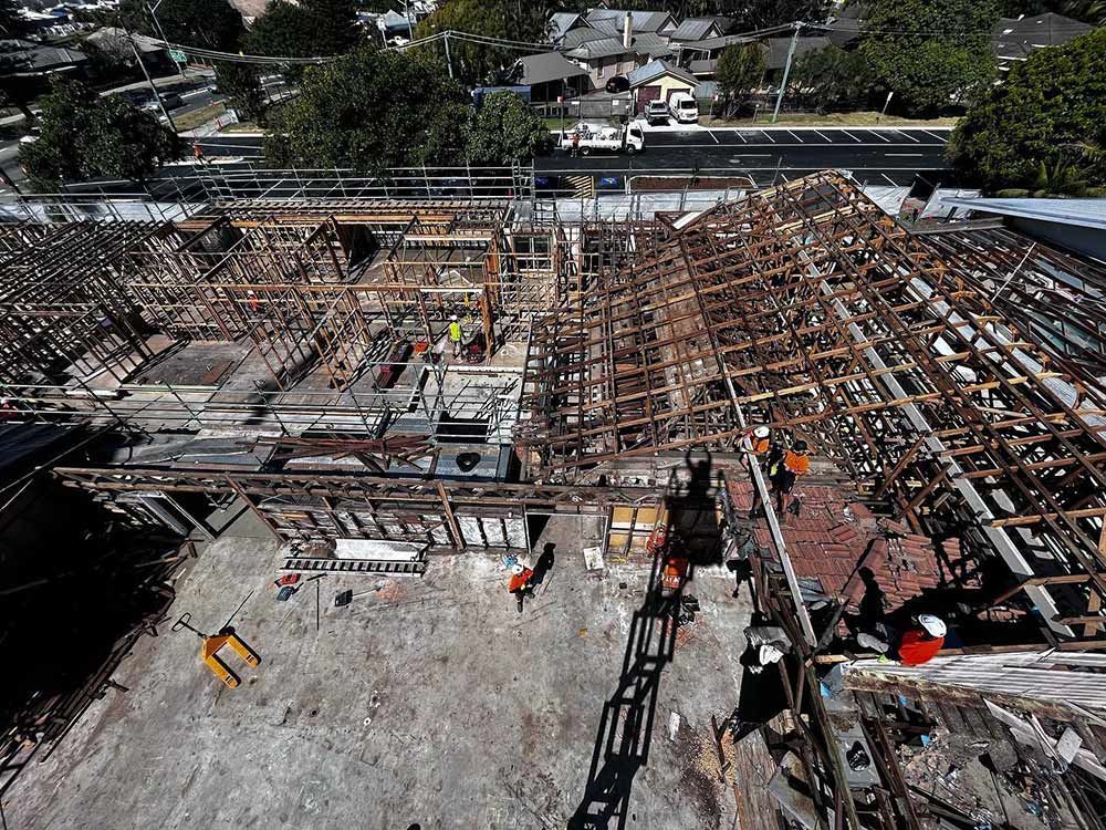 An Aerial View of A Building Under Construction in A City — Northern Rivers Demolition & Asbestos in Skennars Head, NSW