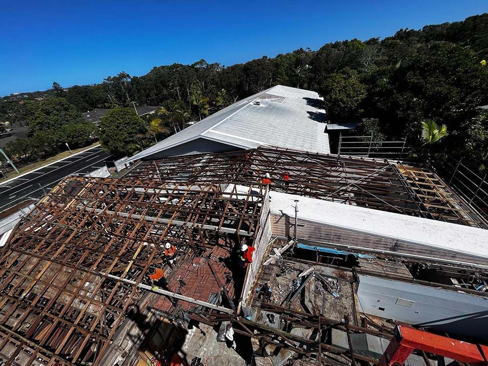 A View of A Building Under Construction with A White Roof — Northern Rivers Demolition & Asbestos in Skennars Head, NSW