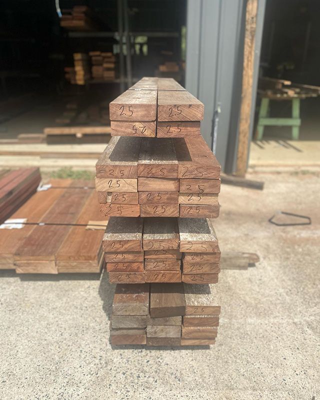 A Pile of Wood Is Stacked on Top of Each Other — Northern Rivers Demolition & Asbestos in Casino, NSW