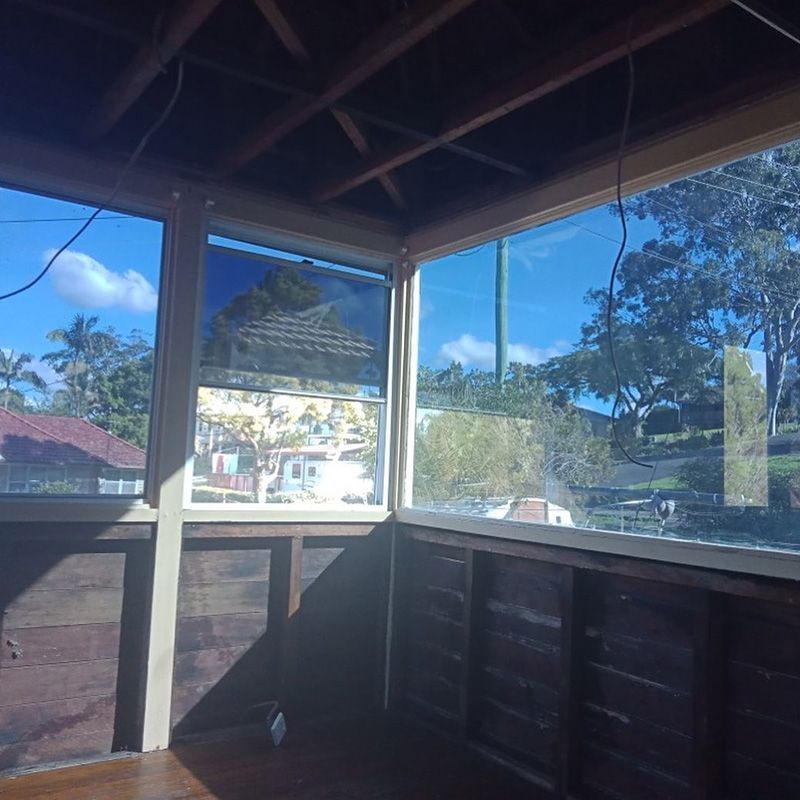 Wooden Wall With Glass Window — Northern Rivers Demolition & Asbestos in Casino, NSW