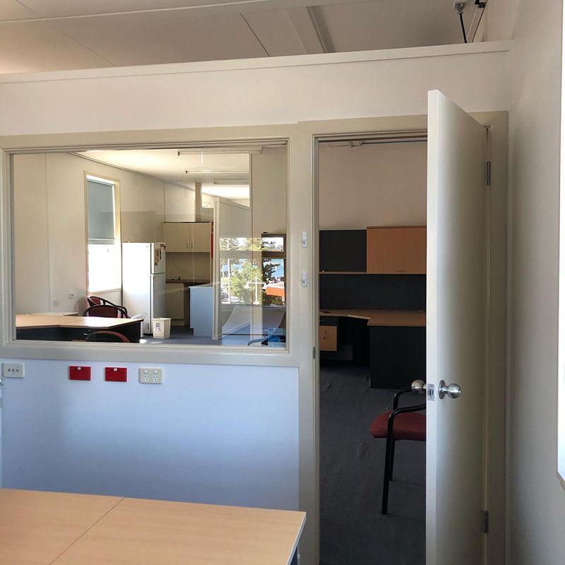 A Kitchen With Cabinets — Northern Rivers Demolition & Asbestos in Tweed Heads, NSW