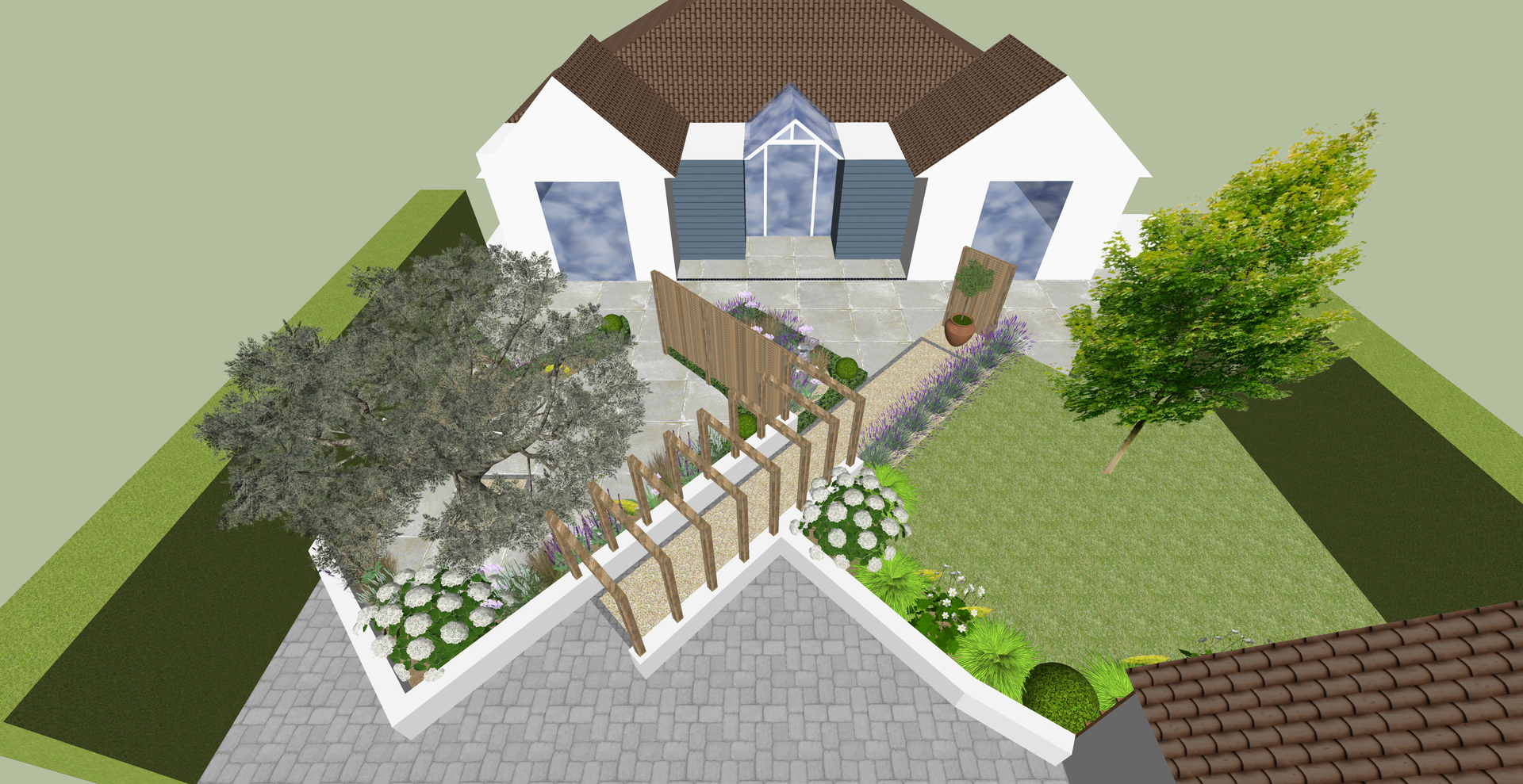 Aerial view of a home's front yard with landscaping, including a fence, trees, and flower beds.