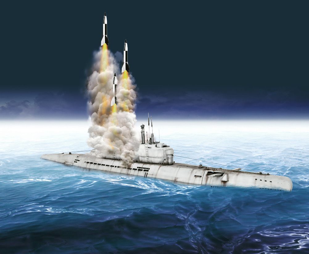 A submarine is in the ocean with a rocket launching from it