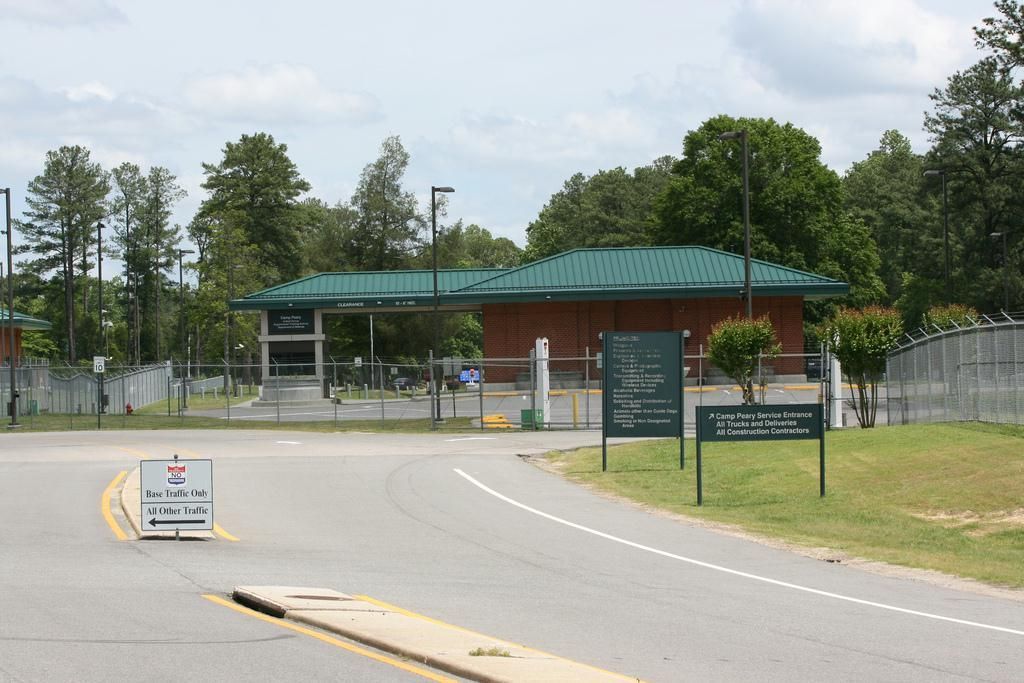 A sign on the side of the road says techmac