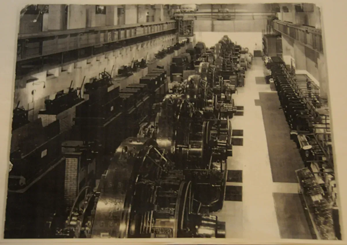 A submarine is in the ocean with a rocket launching from it