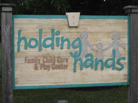 Sign — Mullica, NJ — Holding Hands