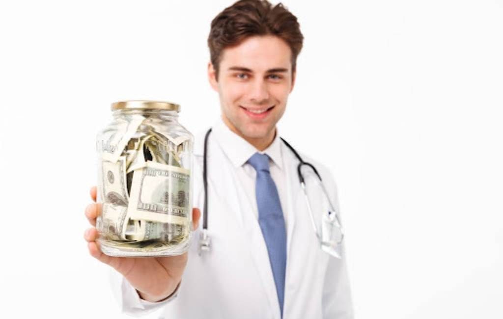 Doctor holding a jar filled with cash, suggesting healthcare costs or medical savings.