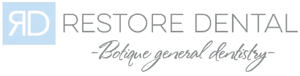 Restore Dental logo with light blue and gray text on a white background